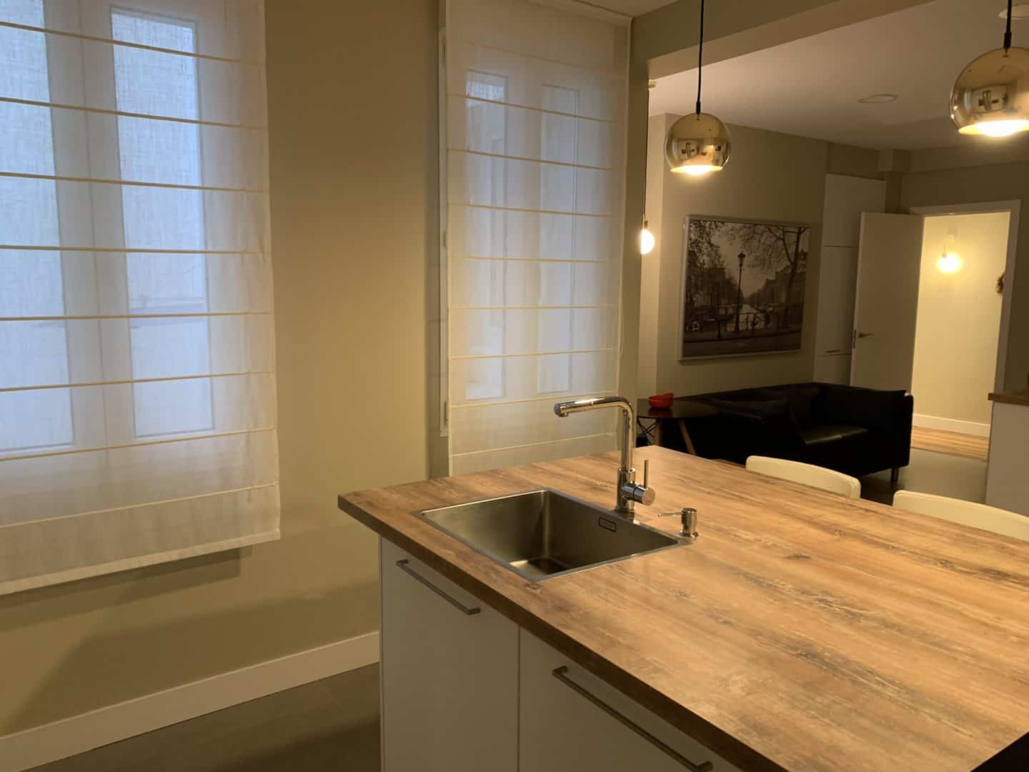 Cocina con zona de estar integrada · vista 6