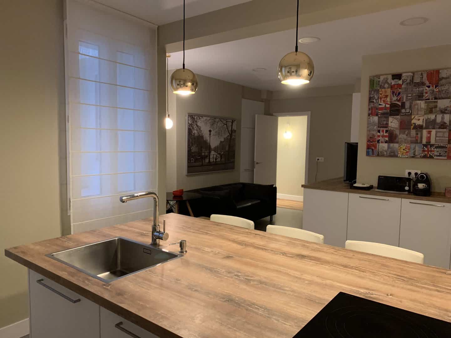 Cocina con zona de estar integrada · vista 7